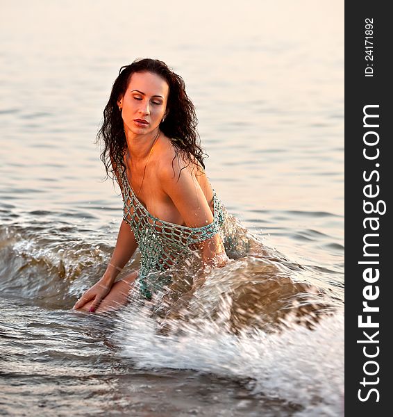 Seminude Girl  In The Waves