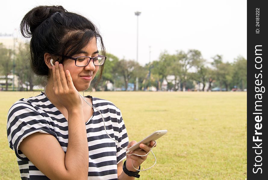 Woman listening to Music outdoor