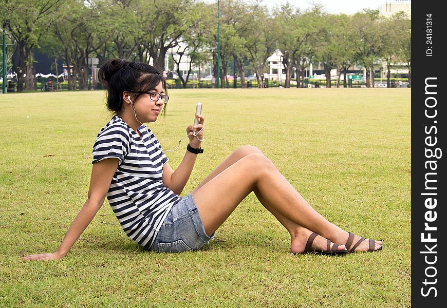 Woman Relaxing And Listening To Music