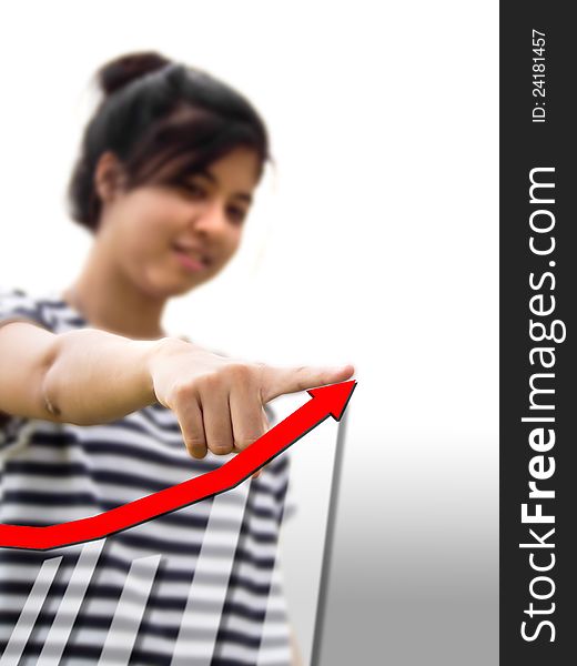 Woman touching a businesss graph.