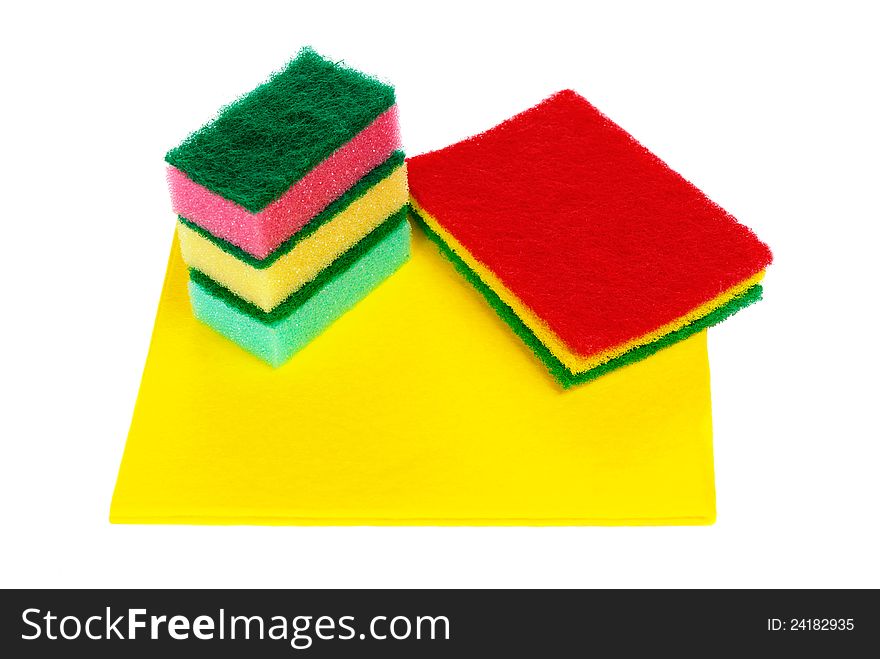 Different colours bast and napkin for washing isolated on a white background