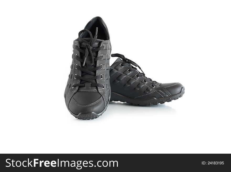 Pair of new leather sport shoes on white background.  with clipping path. Pair of new leather sport shoes on white background.  with clipping path