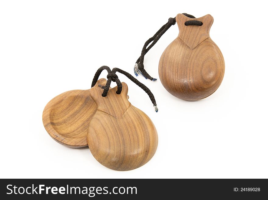 Spanish castanets typical musical instrument with white background