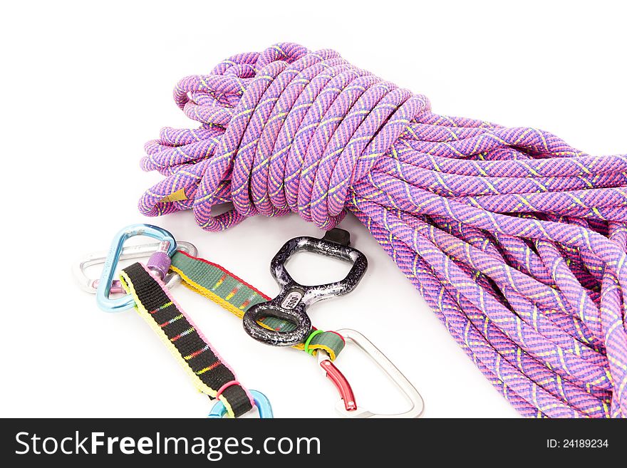 Climbing rope with carabiners with white background. Climbing rope with carabiners with white background