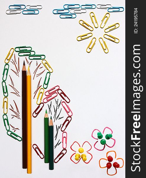 On a light background by means of paper clips,pencils and buttons the natural composition is represented. On a light background by means of paper clips,pencils and buttons the natural composition is represented.