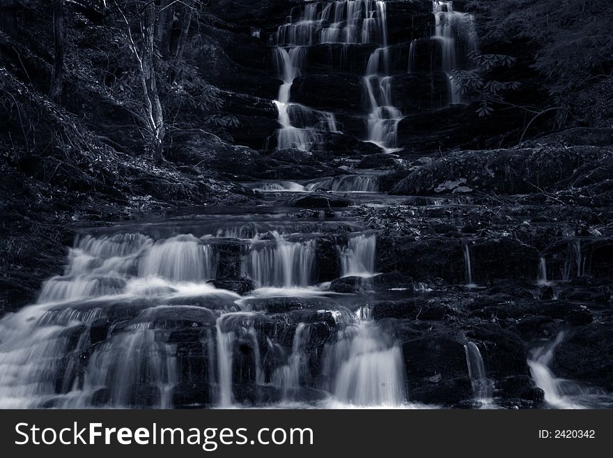 Waterfall cascade with moss