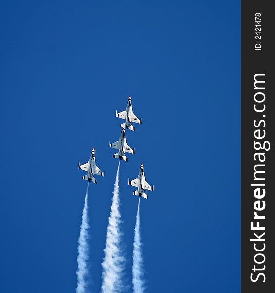 A fighter formation at a air show. A fighter formation at a air show