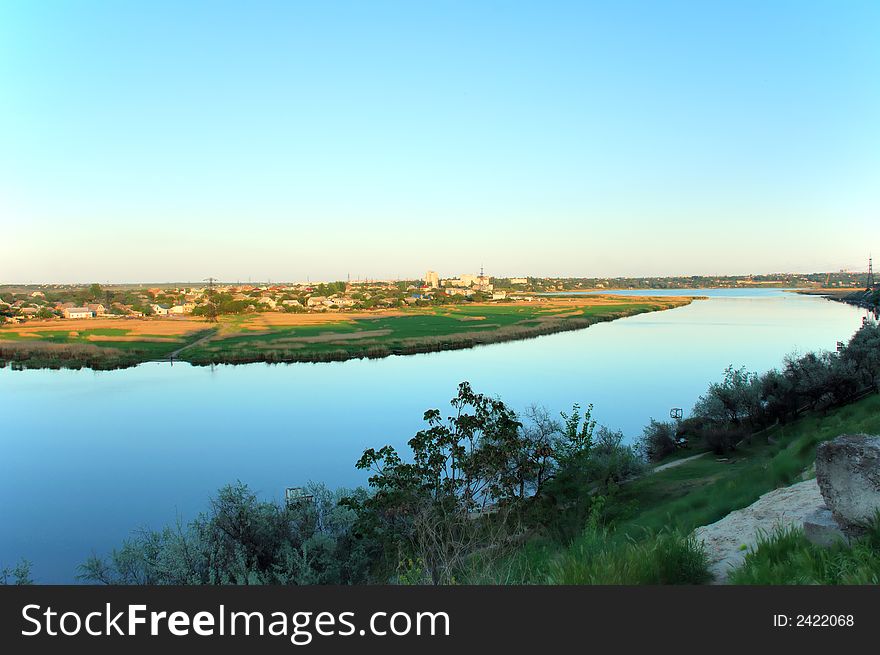 River and blue sky scenic on sunset background. River and blue sky scenic on sunset background