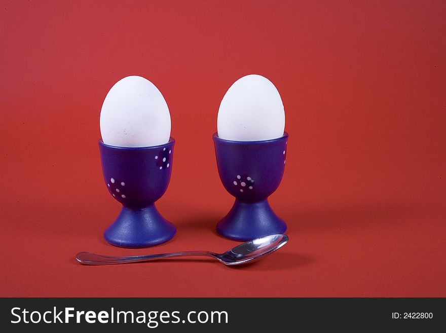 Two white egg on red background. Two white egg on red background