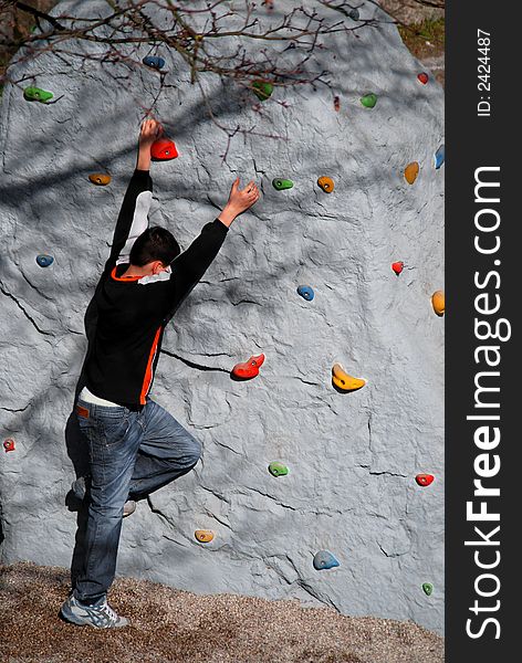 Young boy make his first impression of climbing. Young boy make his first impression of climbing