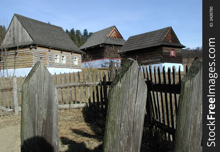 View  of traditional slovak village with old buildings made of wood. View  of traditional slovak village with old buildings made of wood.