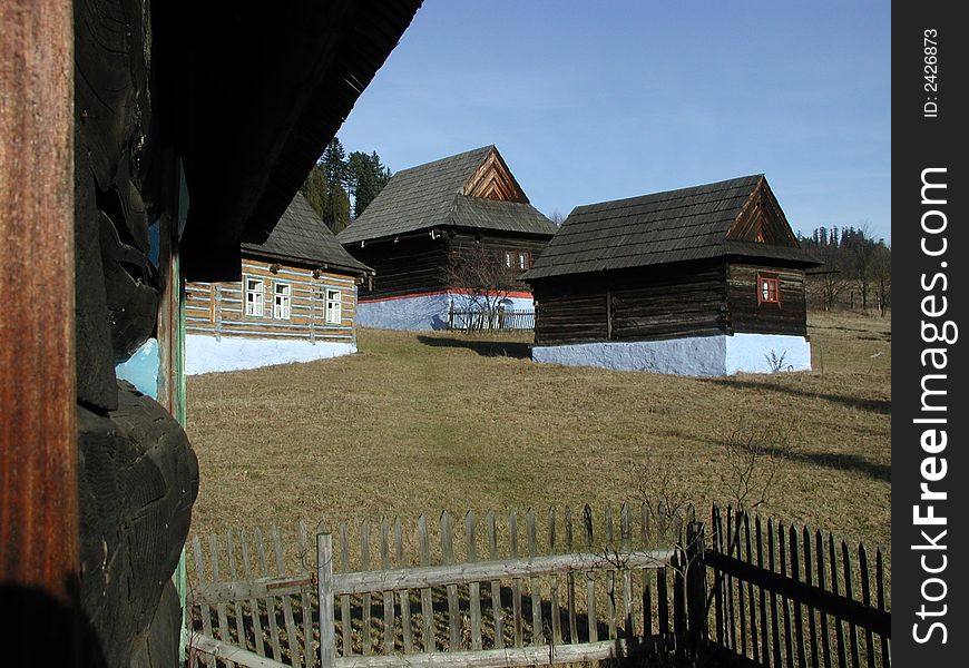 Traditional slovak village  with old wooden houses, fences, ...