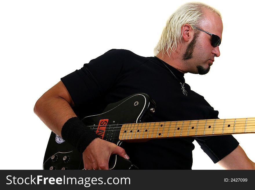 Rock guitarist with an electric guitar, isolated on white background