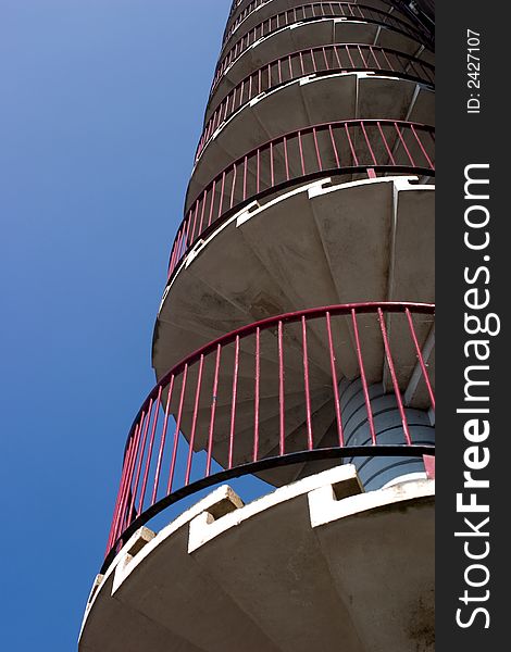 Spiral staircase against a clear blue sky

<a href=http://www.dreamstime.com/search.php?srh_field=building&s_ph=y&s_il=y&s_sm=all&s_cf=1&s_st=wpo&s_catid=&s_cliid=301111&s_colid=&memorize_search=0&s_exc=&s_sp=&s_sl1=y&s_sl2=y&s_sl3=y&s_sl4=y&s_sl5=y&s_rsf=0&s_rst=7&s_clc=y&s_clm=y&s_orp=y&s_ors=y&s_orl=y&s_orw=y&x=32&y=17> See more buildings</a>