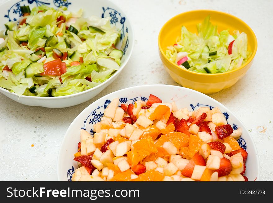 Fresh healthy fruit salads in bowls