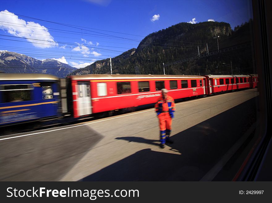 A Fast Passing Train with Scenic Mountain View
