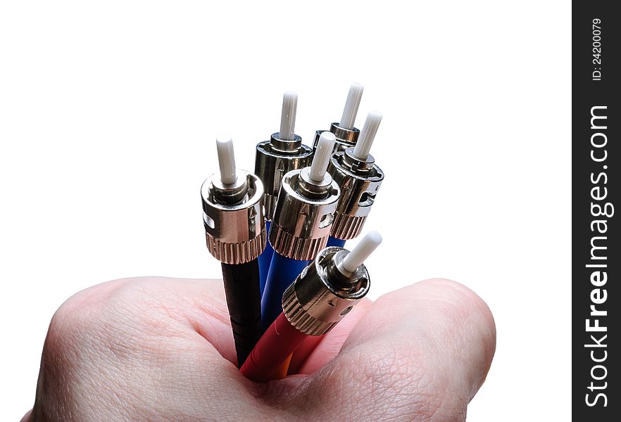 Several optical connectors ST-type in hand. Isolated on a white background. Several optical connectors ST-type in hand. Isolated on a white background.
