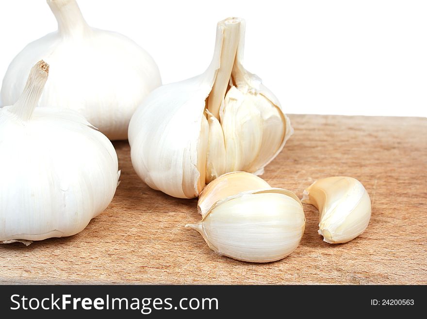 Fresh garlic on the wooden desk