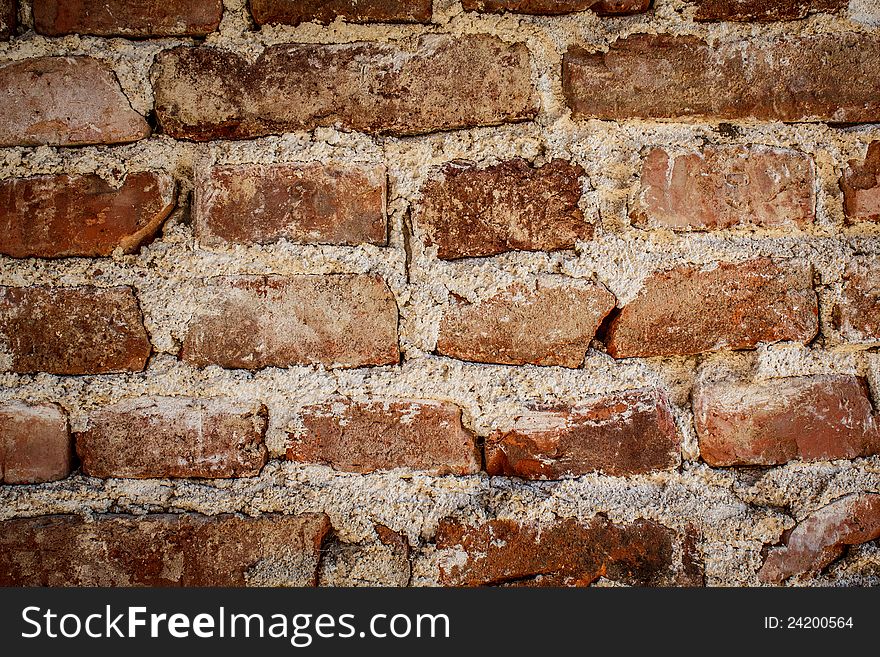 Toned red brick wall grunge background or texture