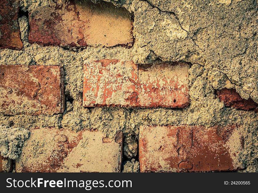 Toned red brick wall grunge background or texture