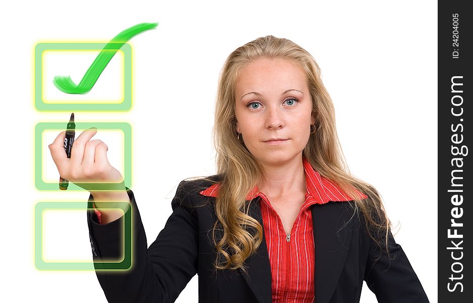 Young business woman with a virtual green check mark on a virtual monitor. Young business woman with a virtual green check mark on a virtual monitor