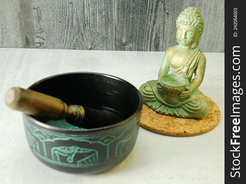 TIme to meditate, unwind, destress, focus, be mindful, practice patience, empathy, devotion, self time,  with a few items to help initiate.  buddha statue, tibetian singing bowl, with stick to make noise,  Meditation, peace, finding peace, joy, happiness. TIme to meditate, unwind, destress, focus, be mindful, practice patience, empathy, devotion, self time,  with a few items to help initiate.  buddha statue, tibetian singing bowl, with stick to make noise,  Meditation, peace, finding peace, joy, happiness.