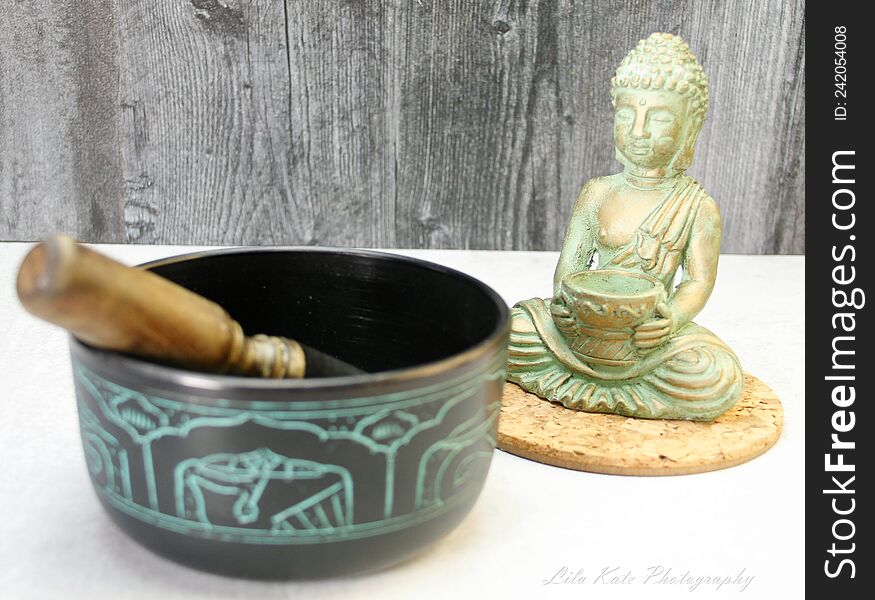 TIme to meditate, unwind, destress, focus, be mindful, practice patience, empathy, devotion, self time,  with a few items to help initiate.  buddha statue, tibetian singing bowl, with stick to make noise,  Meditation, peace, finding peace, joy, happiness. TIme to meditate, unwind, destress, focus, be mindful, practice patience, empathy, devotion, self time,  with a few items to help initiate.  buddha statue, tibetian singing bowl, with stick to make noise,  Meditation, peace, finding peace, joy, happiness.