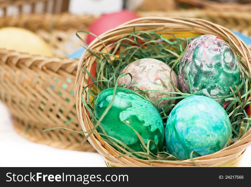 Colorful easter eggs with basket