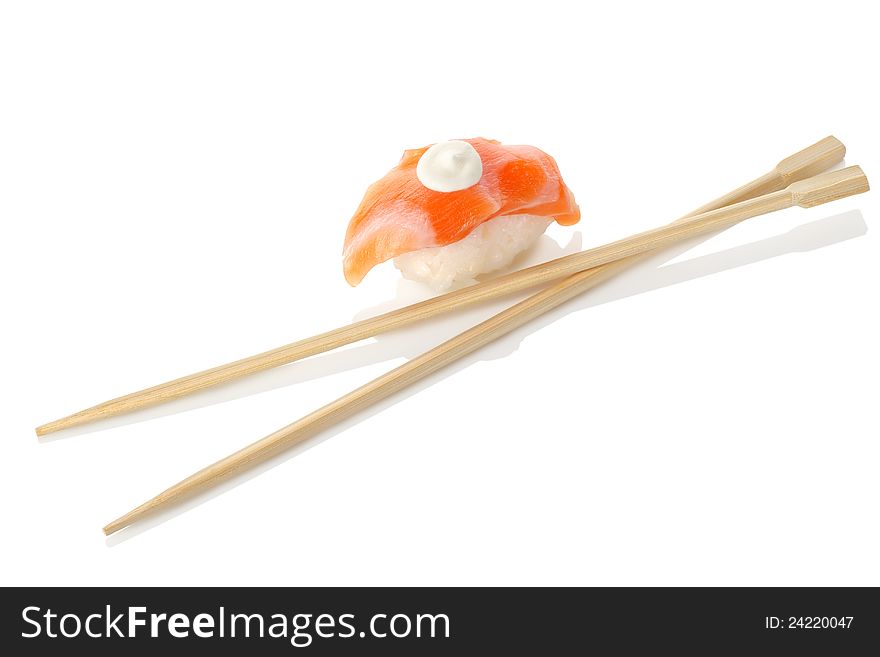 Wooden chopsticks and sushi isolated on a white background