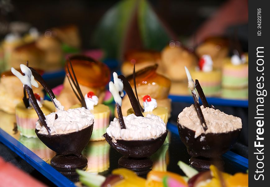 Pieces of cakes and sweets prepared for party