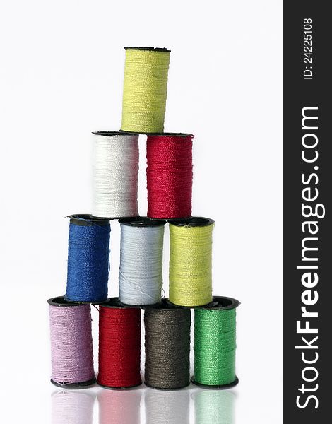 Ten Colored Spools Of Thread