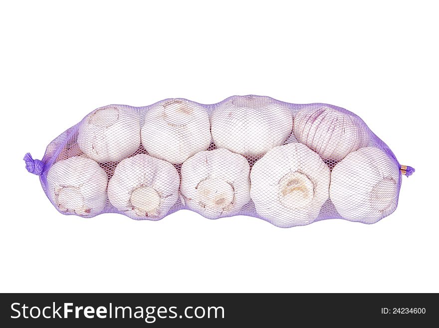 Packed bundle of garlic. On a white background.