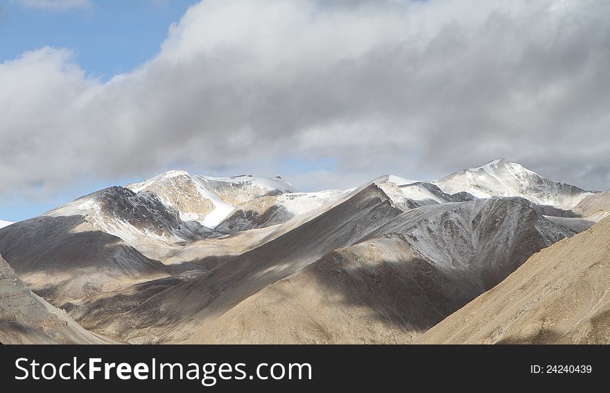 Foothills of the Tibetan landscape with river and mountains. Foothills of the Tibetan landscape with river and mountains