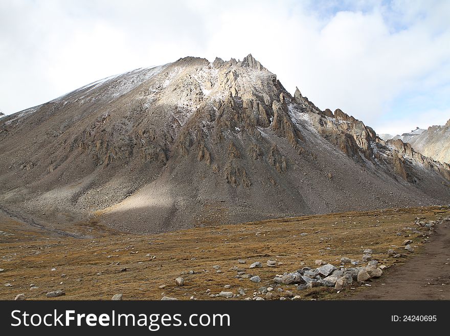 Foothills of the Tibetan landscape with mountains. Foothills of the Tibetan landscape with mountains