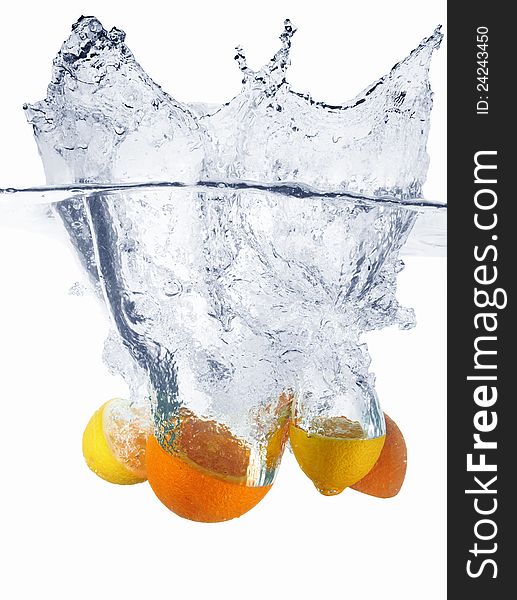 Fresh fruits in water splash