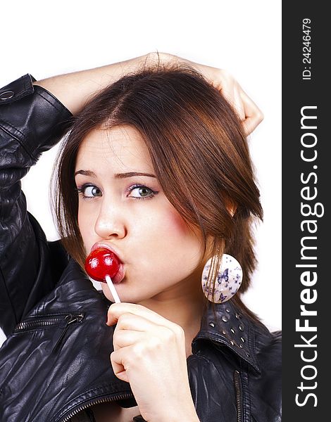 Portrait of sensual pretty woman holding lollipop caramel, close up, over white