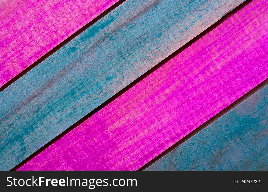 Colored wooden-painted wood surfaces