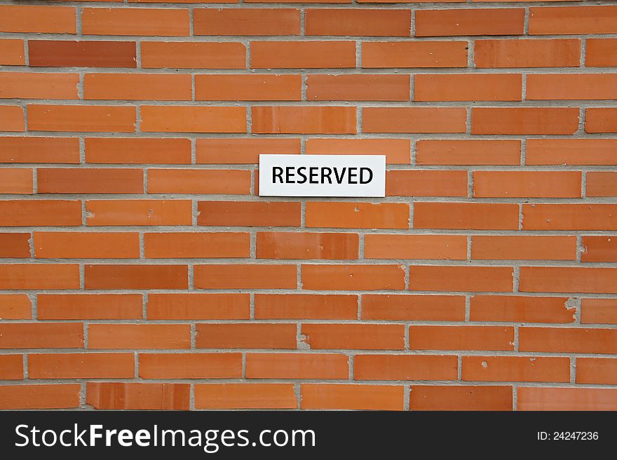 Brick wall with notificationÂ´s sheet - reserved