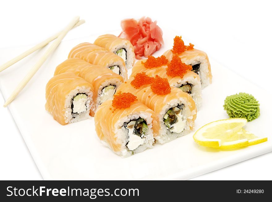 Salmon sushi and chopsticks on white background
