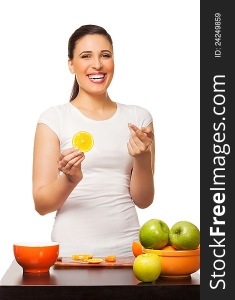 Young laughing woman with fruit isolated on white background