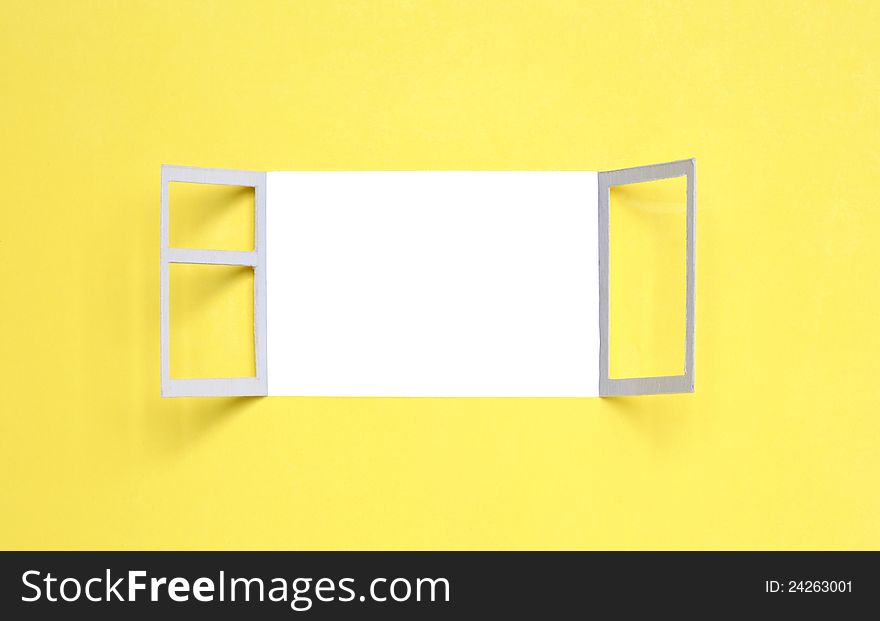 Yellow paper background with open window for your images. Clipping path is included