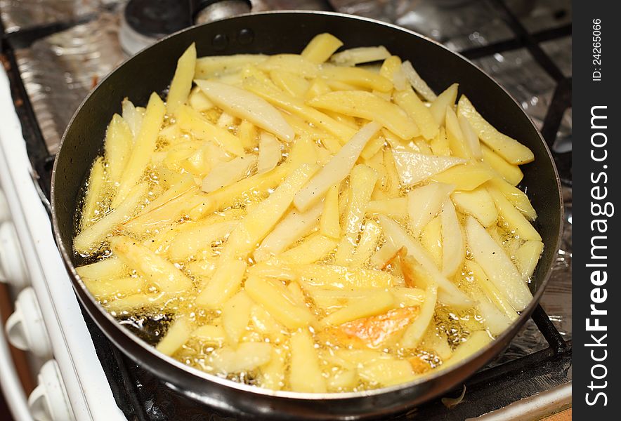 Potatoes fried in a pan