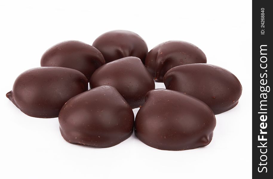 Chocolate candies on white background