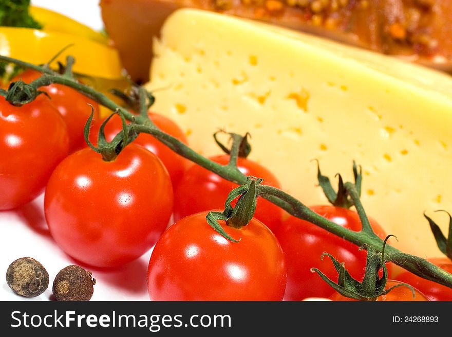 Background with cherry tomatoes, cheese and ham. Background with cherry tomatoes, cheese and ham