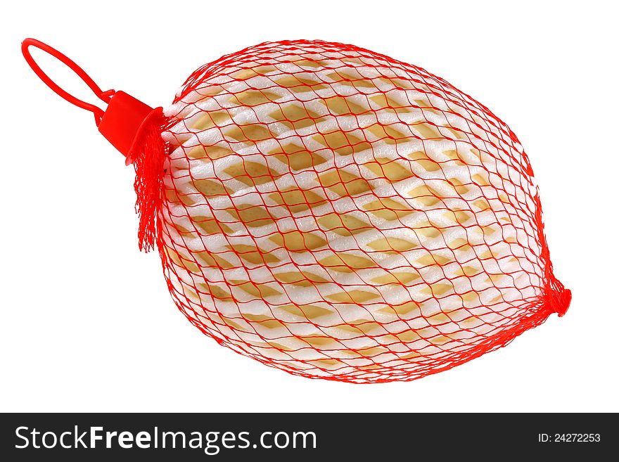 Fresh Cantaloup melon wrapped in a red plastic mesh bag (foam net) isolated on white. Fresh Cantaloup melon wrapped in a red plastic mesh bag (foam net) isolated on white