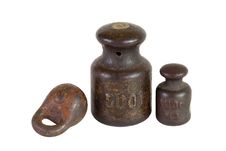 Three Of The Old Weights For Scales Royalty Free Stock Images