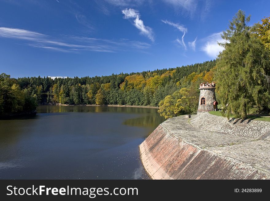 Pond with autumn trees and blue sky cloud. Pond with autumn trees and blue sky cloud
