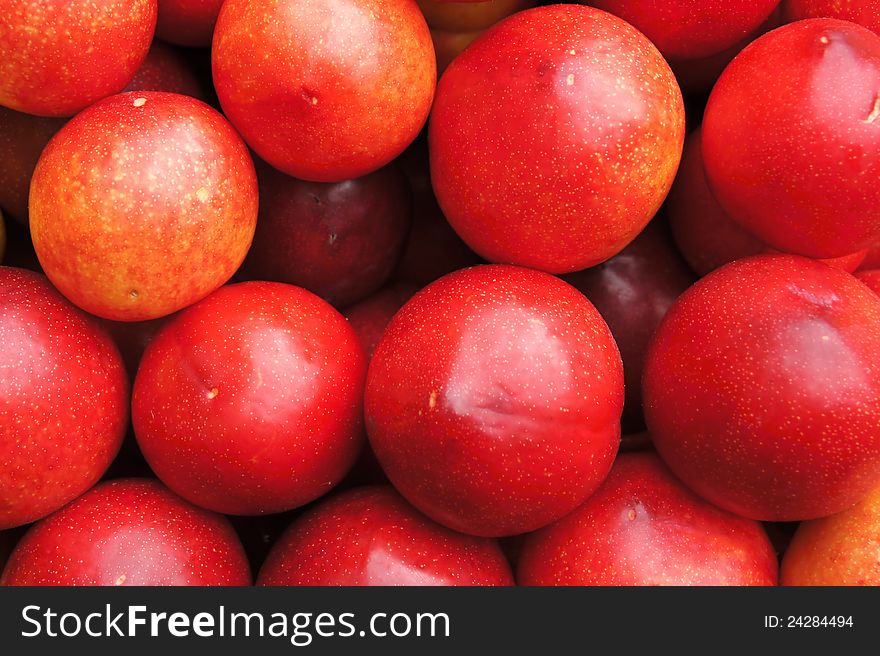 Heaps of big round plums. Heaps of big round plums