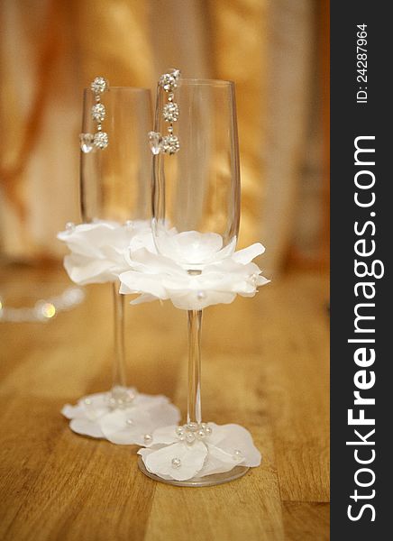 Pair empty decorated wineglasses