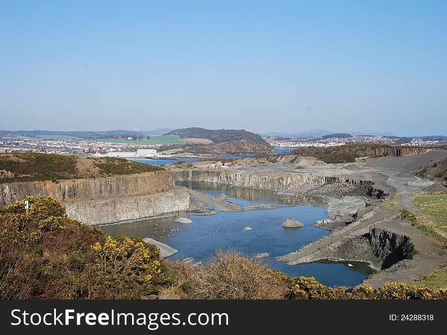 A view into a massive opencast quarry near the Fife town of Inverkeithing. A view into a massive opencast quarry near the Fife town of Inverkeithing